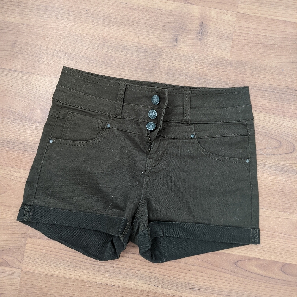 Khaki green button fly shorts.